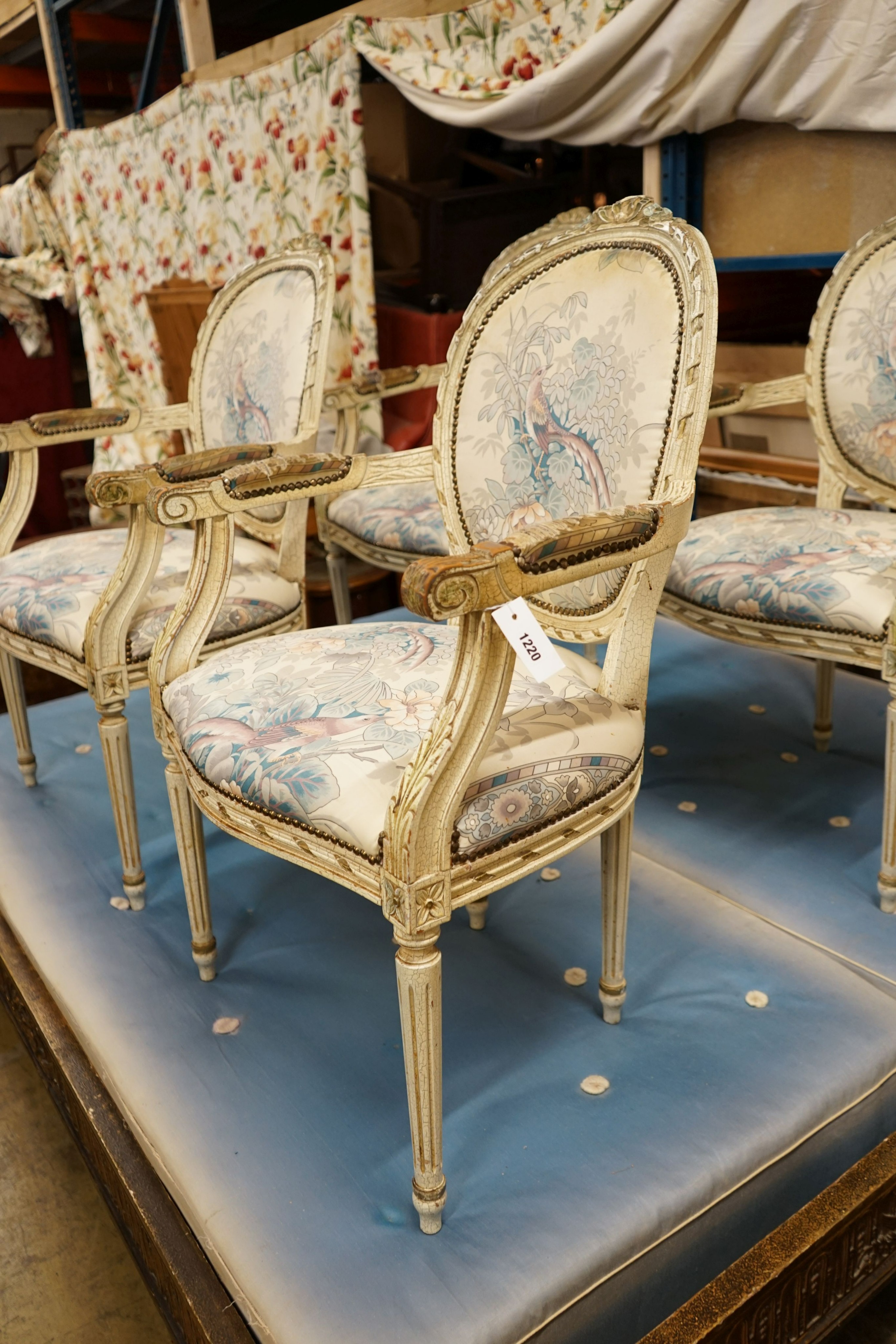 A set of four painted open armchairs, width 59cm, depth 50cm, height 95cm